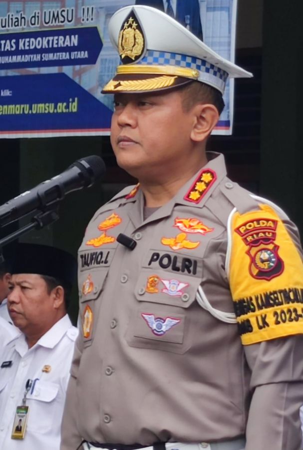 Cooling Sistem Dirlantas Polda Riau Pimpin Police Goes To School di SMAN 2 Model