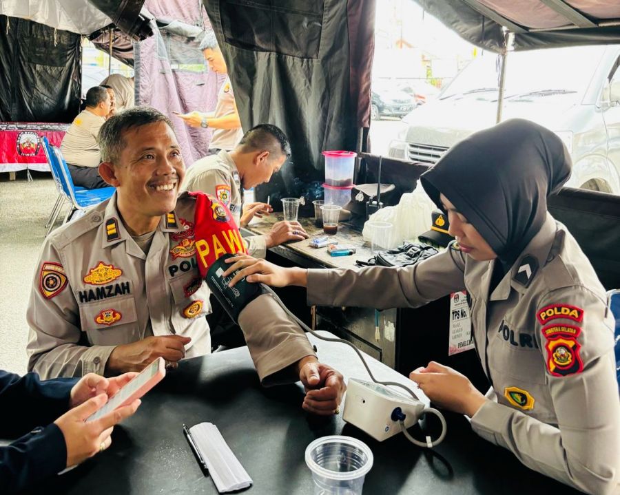 Tim Dokkes Polda Sumsel dan Jajaran Lakukan Patroli Sambang TPS, Beri Layanan Kesehatan Petugas